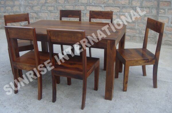 trendy wooden dining table with 6 chair set Sunrise Exports
